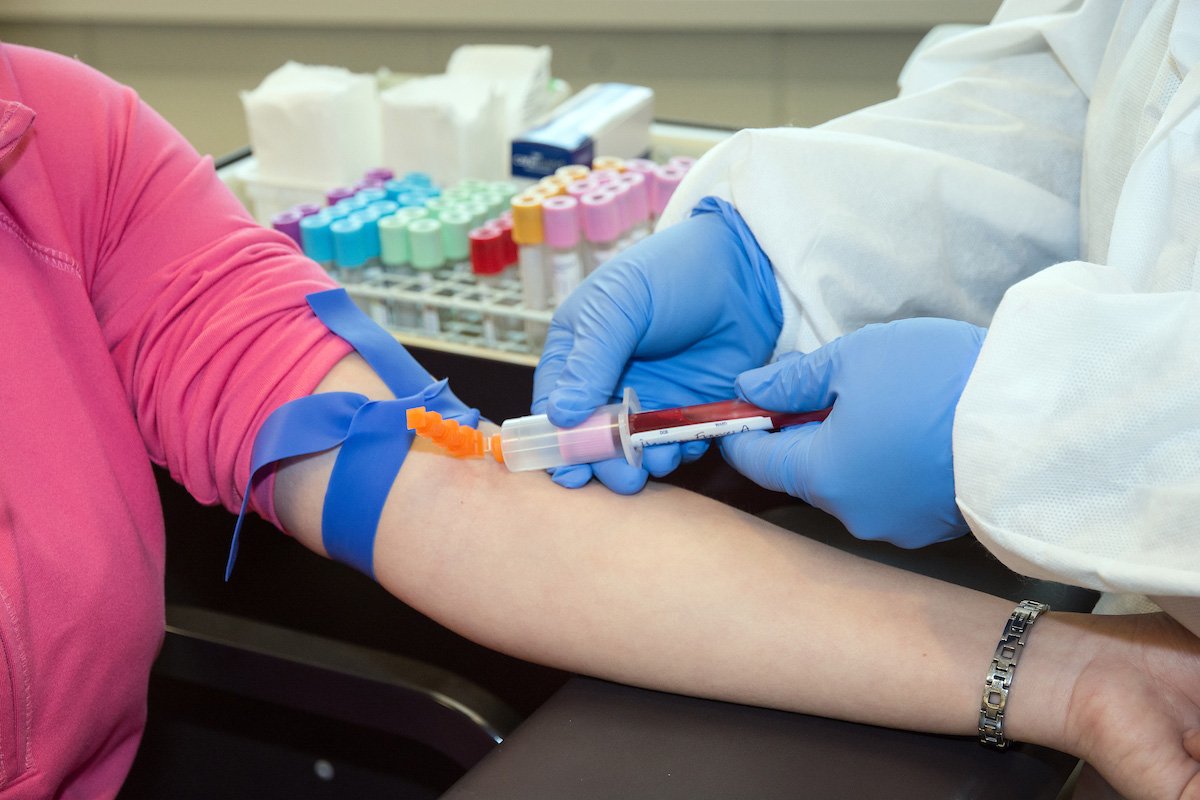 Medical professional conducting rapid diagnostic test